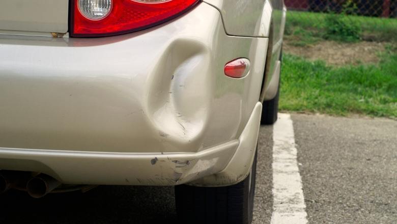 plastic bumper dent on a car