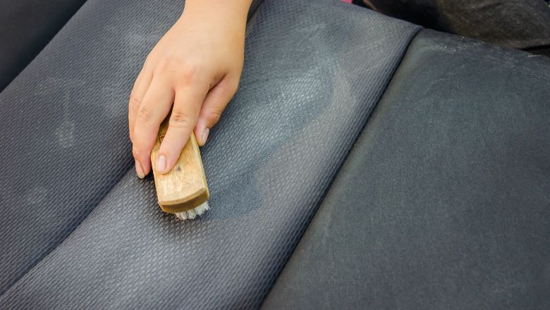 brushing stained car seats