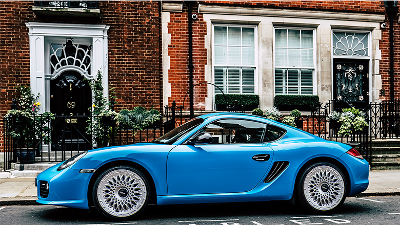 silver wheels on a blue car